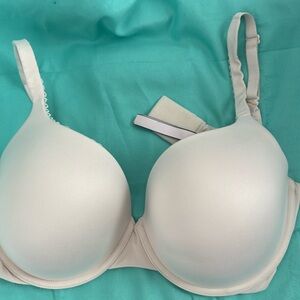 VS underwire bra size  38DD.  Beige in color.